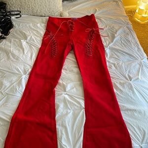 RED FLARE JEANS WITH TIES